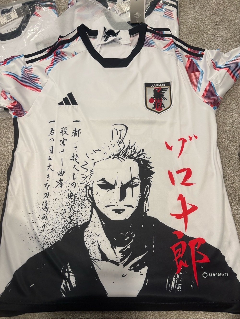 adidas Japan Graphic Men’s zoro one piece soccer jerseys. Slim fit (size up)